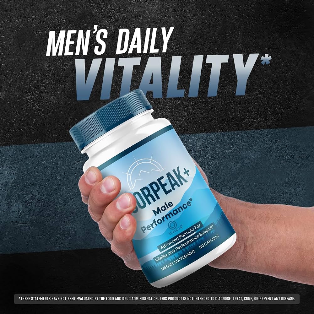 VigorPeak+ Male Performance capsule bottle placed on gym floor in front of large branded wall sign reading VigorPeak+ Capsules with tagline Turn Efforts into Results – men's dietary supplement for vitality and performance support